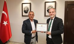 Rektör Prof. Dr. Hasan Uslu’ya Fahri Hemşehrilik Beratı